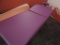 Purple Oak works lift massage table.