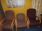 Three upholstered chairs.