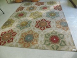 8'x10' flower pattern rug.
