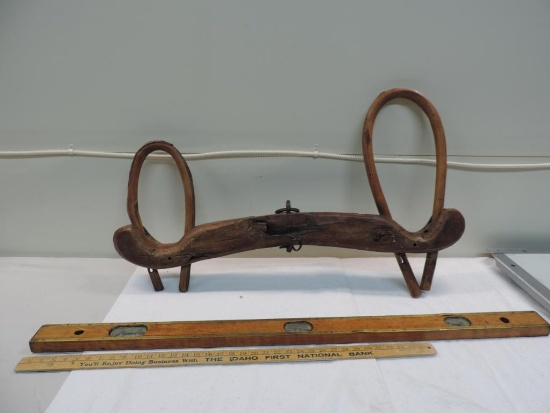 Cool Primitive ox yoke with 48" Brass accented level.