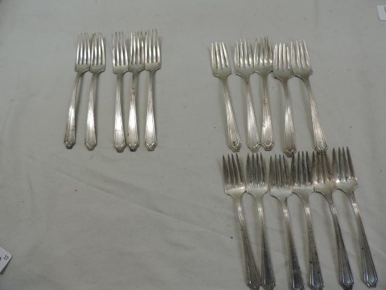 Sixteen sterling silver forks.