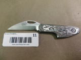 Famas engraved hawkbill knife