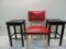 Two stools with vintage red tacked back chair.