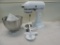 White kitchen aide classic mixer with bowl-attachments.