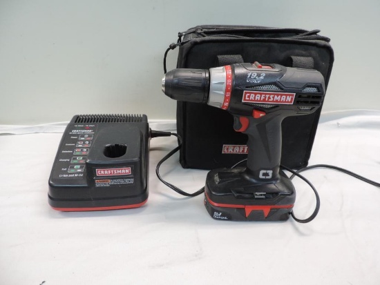 Craftsman 19.2 volt 1/2" cordless drill driver with charger and bag.