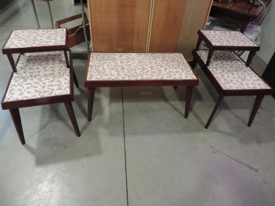 Three piece mid century tile top table set.