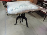 Wabash Delft Enamel top adjustable height table with cast iron base.
