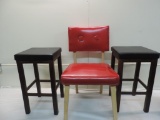 Two stools with vintage red tacked back chair.