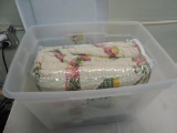 Flowered bed spread with shams & plastic box.