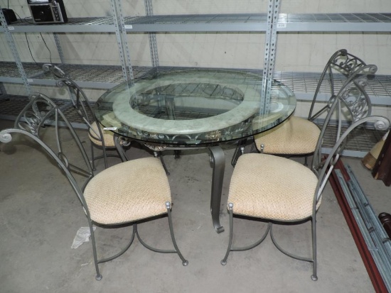 Glass Top Table with Four Metal Framed Chairs