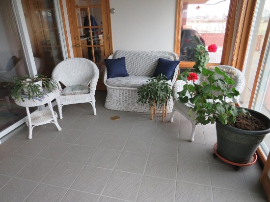 White Wicker Patio Set and Live Plants
