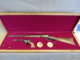 Exceptional Colt SAA and Winchester 94 Serialized Cased Commemorative Set
