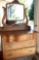 Four Drawer Serpentine Front Antique Dresser with Mirror