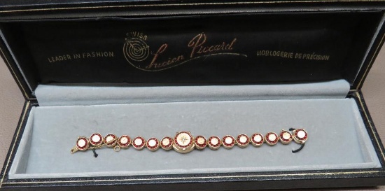 Stunning Lucien Piccard Gold and Gemstone Ladies Wrist Watch