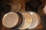 Array of Pizza Pans and Cooking Baskets