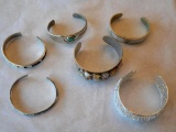 Six Silver Tone Bracelets