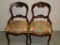 Pair of Ornate Carved Antique Chairs