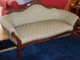Antique Loveseat with Carved Wood Trim