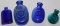 Four Small Blue Glass Bottles