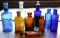 Nine Antique Poison and Worm Killer Bottles