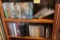 Two Shelves of Hardcover Novels and Reference Books