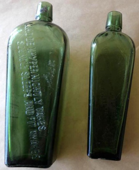 Two Green Dekuyper's Square Face Bottles