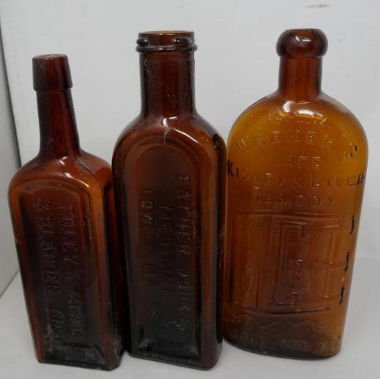 Three Antique Amber Bottles