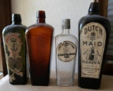Four Antique Geneva Gin Bottles