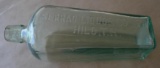 Serrao Liquor Co Hilo T.H. Bottle