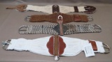 Four Western Saddle Cinches
