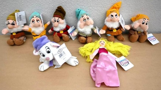 Eight Disney Dolls