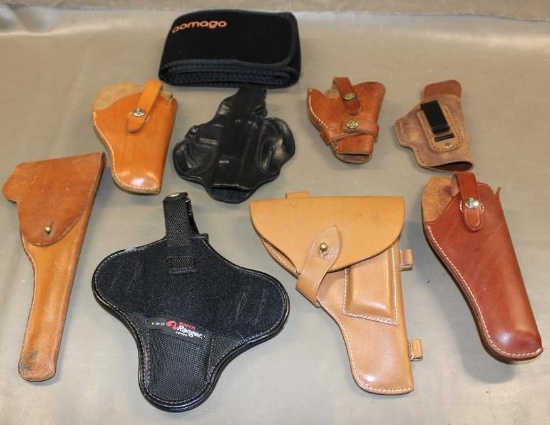 Eight Leather Handgun Holsters and Support Brace