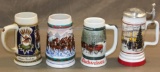 Three Budweiser and One Coors Brewing Collectible Steins