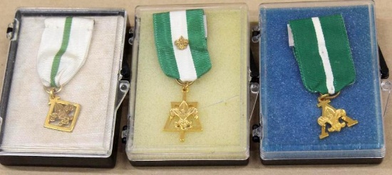 Three Gold-Colored Scouting Medals