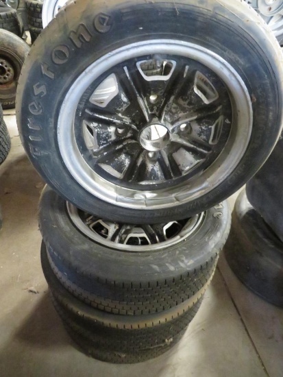 Four Aluminum Four Hole Rims and Tires