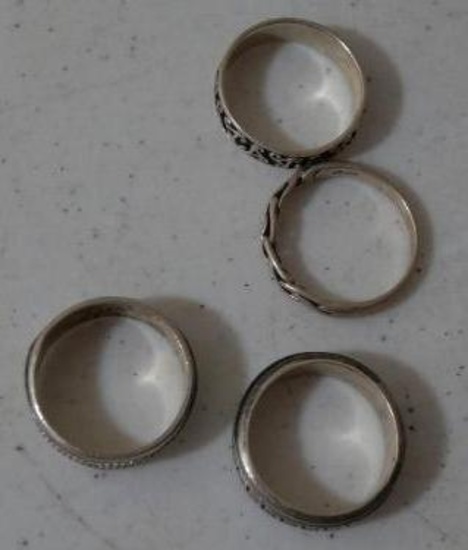 Four Sterling Rings Size 11