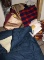 Mixed Blankets and Contents of Closet Floor