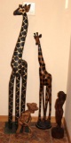 Tall Wood Giraffes and Human Figures