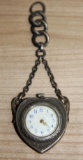 Unusual Silver-Colored Heart-Shaped Watch