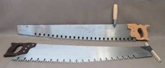 Two Misery Whip Hand Saws