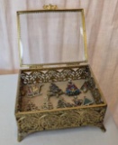 Christmas Brooches in Showcase