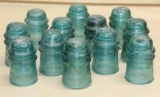 12 Antique Green Glass Insulators