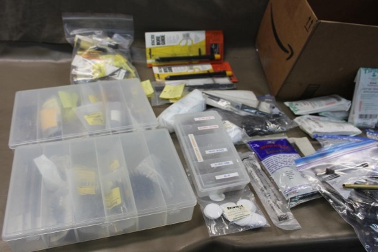 Box Filled with Firearms Cleaning and Care Supplies