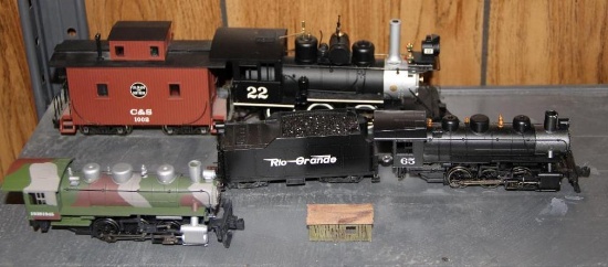 Three HO Scale Locomotives with Cars