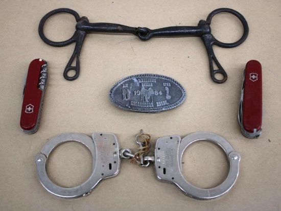Swiss Army Knives, S&W Handcuffs, Belt Buckle, and Hand-Forged Bit