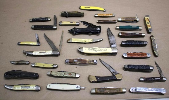 Approximately 31 Mixed Folding Knives