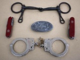 Swiss Army Knives, S&W Handcuffs, Belt Buckle, and Hand-Forged Bit