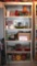 Metal Shelf Storage Cabinet with Slide-Down Doors and All Contents