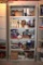 Metal Shelf Storage Cabinet with Slide-Down Doors and All Contents