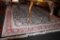 Detailed Red and Blue Floral Wool Area Rug Labeled 8' x 10'